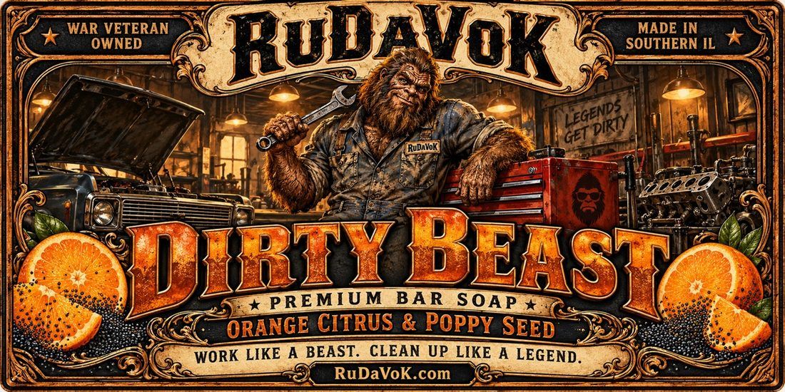 Dirty Beast poster — a Sasquatch mechanic in a garage under a RuDaVoK sign, Dirty Beast premium bar soap, orange citrus and poppy seed